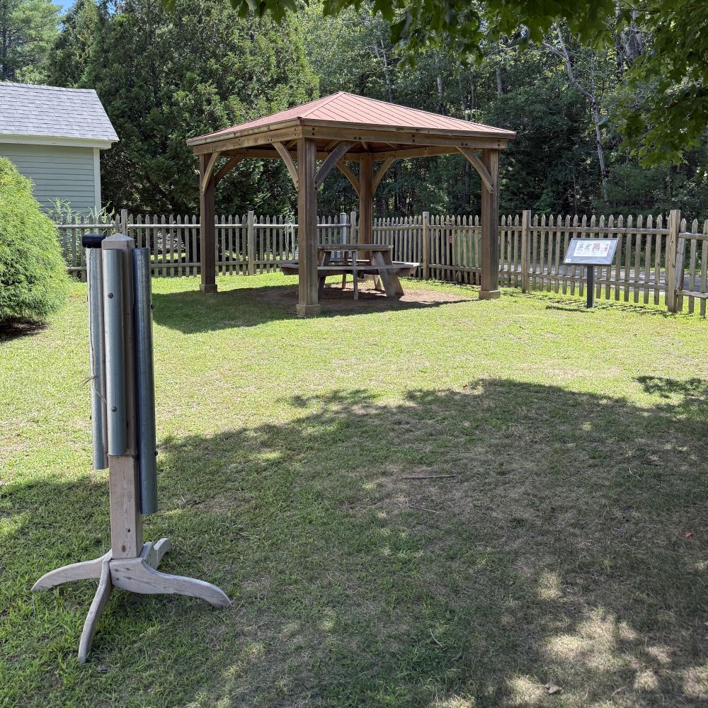 The pedestal pipes in the storygarden, with the gazebo in the background. 