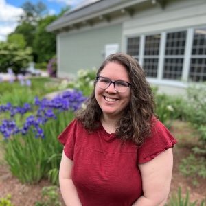 Courtney smiling in the Nesmtih Butterfly Garden